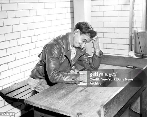 Lester Funk engages in dynamic facial contortions as he tries to fill out his fuel-oil application at P.S. 59, at 57th St. And Third Ave....