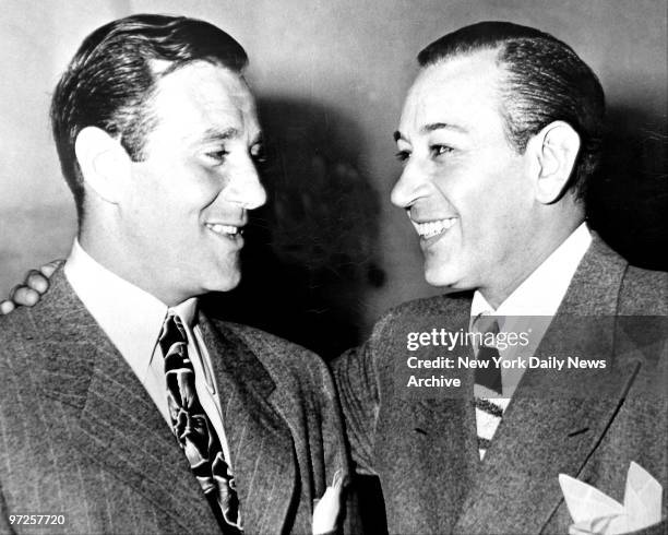 Benjamin Bugsy Siegel talks to George Raft.