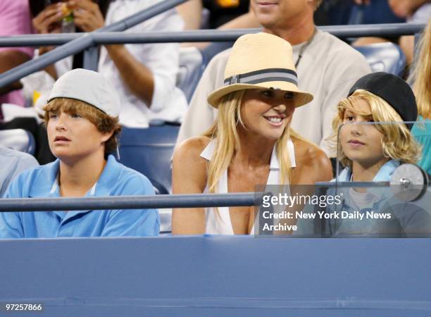 Christie Brinkley, son Jack Paris and daughter Sailor Lee watch a match between Venus Williams of the United States and Kira Nagy of Hungary in...