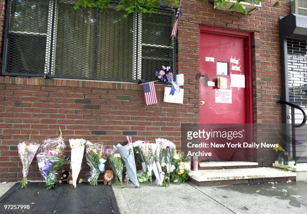 Bergin Hunt and Fish Social Club on 101 Avenue and 99th Street in Ozone Park, Queens. Flowers for John Gotti line the sidewalk with notes and the...
