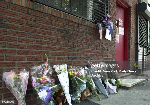 Bergin Hunt and Fish Social Club on 101 Avenue and 99th Street in Ozone Park, Queens. Flowers for John Gotti line the sidewalk with notes and the...