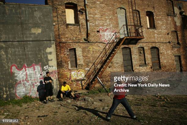 Kids play baseball in an abandoned lot off of Third Avenue in the South Bronx where major re-zoning has been approved which stands to severely change...