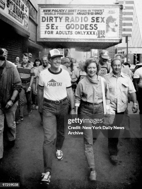 Ex-President Jimmy Carter and wife, Rosalynn, walk along W. 42nd St.