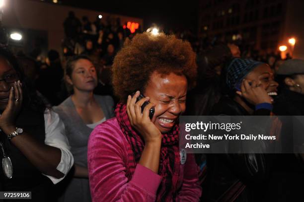 Kimberly Dalton Mitchell of Astoria, weeps after hearing the results. New Yorkers react as Obama is announced the winner as they watch television on...