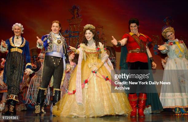 Christy Carlson Romano and the cast of "Beauty and the Beast" take a curtain call at the Lunt Fontanne Theatre following a performance marking the...