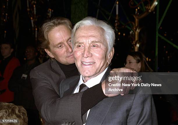 Kirk Douglas gets a big hug froim his son, Michael, at a party in the Russian Tea Room following the premiere of the elder Douglas' new movie...