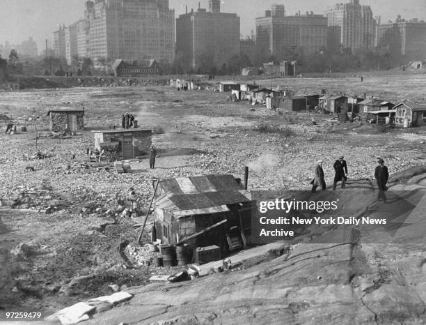 Hooverville in Central Park. A steady stream of vistors tour the small town built on the sight of the old reservoir by ex-soldiers.