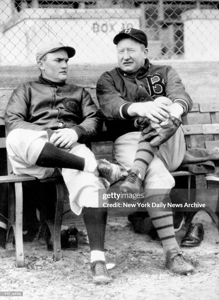 Cincinatti Reds' Charles F. Lucas (left) with Brooklyn Dodge