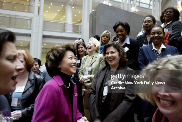 Labor Secretary Elaine Chao greets businesswomen from the area around Ground Zero before joining them at a luncheon in the Ronald Reagan Building in...