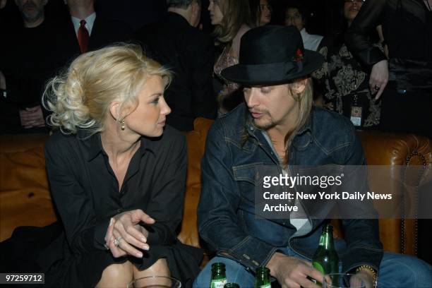 Faith Hill chats with Kid Rock at Warner Music Group's post-Grammy Awards party at the Hudson Hotel on W. 58th St. Hill won a Grammy for Best Female...