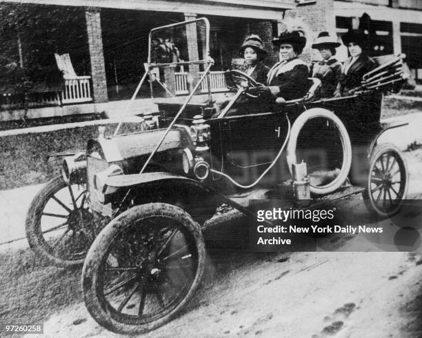 Circa 1916 of Madam C.J. Walker the first Black woman millionaire at the wheel of her car.