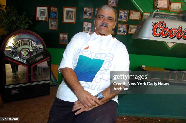 Ronaldo Martinez, who stars in a series of graphic anti-smoking television ads, leans on the pool table in his workplace at La Nueva Sombra in Camuy,...