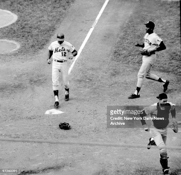 Houston Astros' hurler Don Wilson gets to plate in time to see the Mets' Boswell score second of six runs in a wild first-inning nightcap. Boswell...