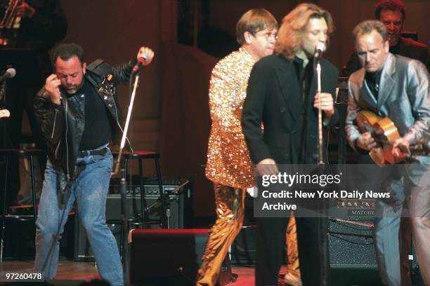 Billy Joel , Elton John, Jon Bon Jovi and Sting onstage during the Rainforest Foundation International Benefit Concert at Carnegie Hall.