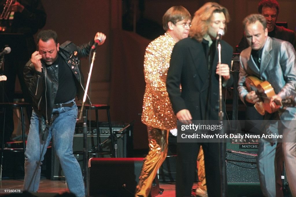 Billy Joel (l.-r.), Elton John, Jon Bon Jovi and Sting onsta
