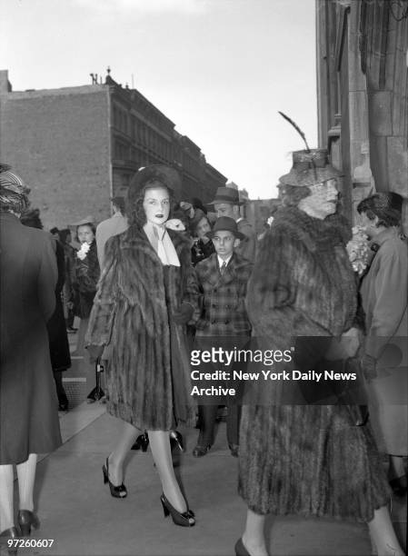 Brenda Frazier, Glamour Girl No.1 outside St. Thomas' Church shortly after she was mobbed by an admiring crowd.