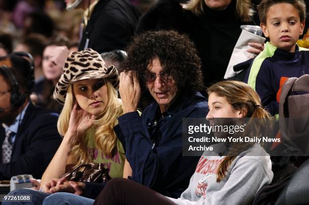 Howard Stern is accompanied by girlfriend Beth Ostrosky and daughter Ashley at a game between the New York Knicks and the Los Angeles Clippers at...