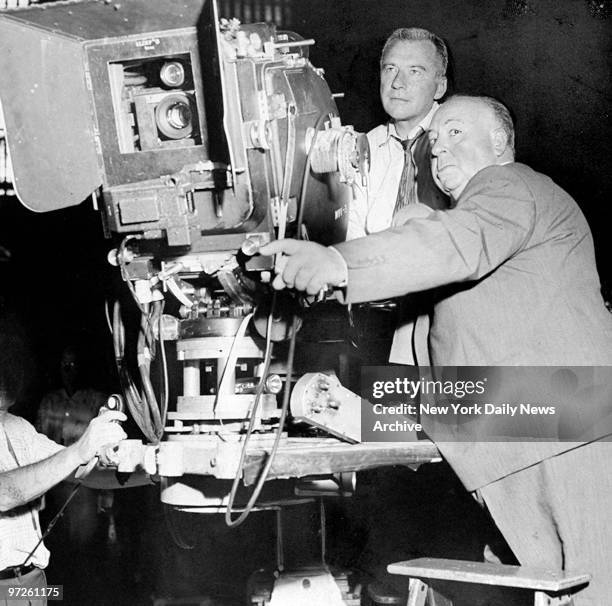 Bob Burke and director Alfred Hitchcock on location at Grand Central Terminal during the making of the movie "North by Northwest."