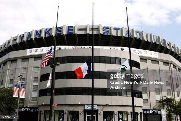 Flags fly at half-mast outside Yankee Stadium the day after New York Yankees' pitcher Cory Lidle died when the single-engine plane he was flying with...