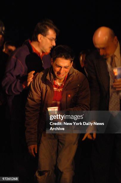 Family Reema Samaha of victim cry at candlelight vigil after Cho Seung Hui shot and killed 32 people and then killed himself at Virginia Tech. Omar...