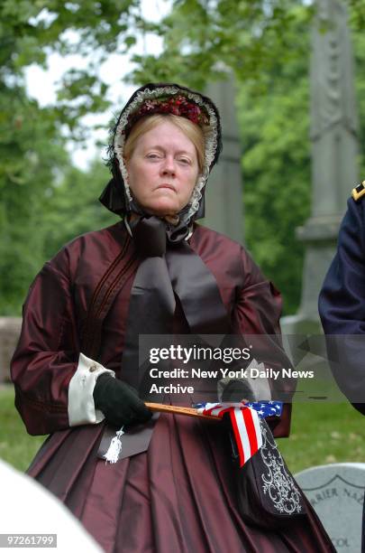 Civil War reenactor Mary Kelly - dressed Amanda Farnum, wife of Union Brig. Gen. John Egbert Farnum - is at Green-Wood Cemetery in Brooklyn honoring...