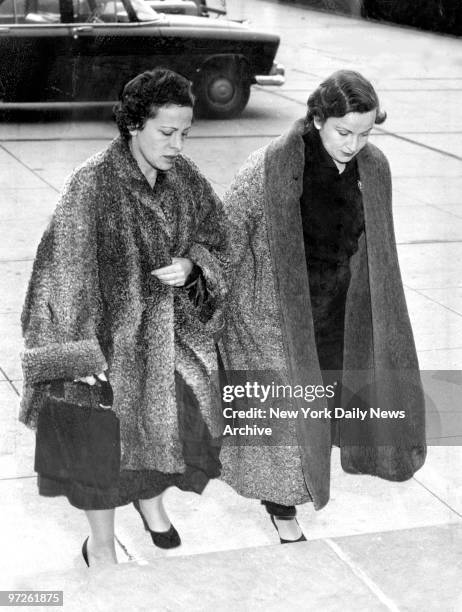 Mrs. Beatrice Weinberger , as she enters Nassau County Court in Mineola with unidentified woman for trial of Angelo LaMarca who kidnapped her son...