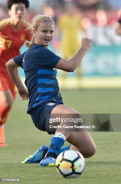 Lindsey Horan of the United States directs the ball in an international friendly soccer match against China at Rio Tinto Stadium on June 7, 2018 in...