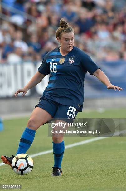 Savannah McCaskill of the United States directs the ball in an international friendly soccer match against China at Rio Tinto Stadium on June 7, 2018...