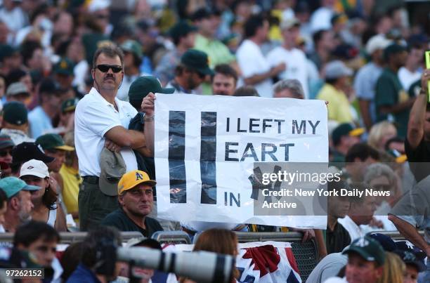 Fans express their feelings about the destroyed World Trade Center with a sign in the stands at Game 3 of the American League Division Series...