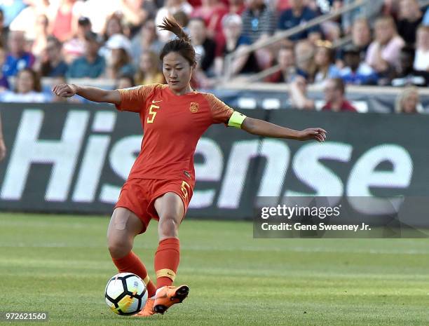 Wu Haiyan of China passes the ball in an international friendly soccer match against the United States at Rio Tinto Stadium on June 7, 2018 in Sandy,...