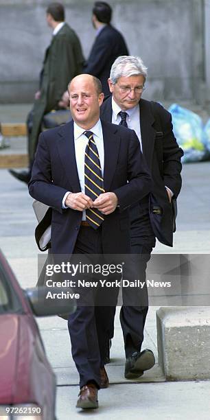 Billionaire Revlon chief Ron Perelman leaves Manhattan Supreme Court followed by his lawyer after first day of court battle with ex-wife Patricia...