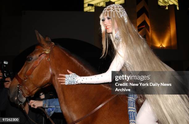 Model Heidi Klum arrives dressed as Lady Godiva on horseback at her Halloween party at Lot 61.