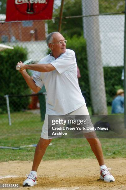 Larry Brown, the New York Knicks' new head coach, is up at bat during the 57th annual Artists and Writers Softball Game this afternoon at Herrick...