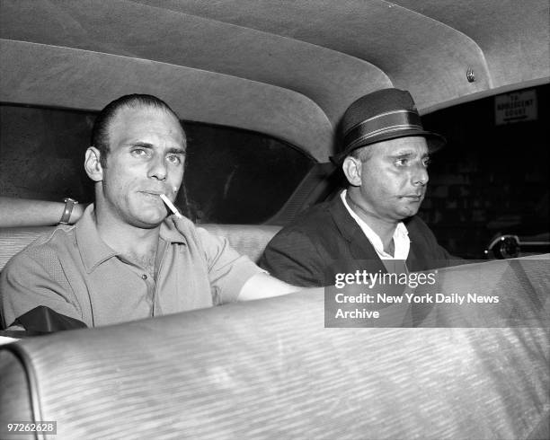 Larry Gallo , with rope burns on neck and brother Joey Gallo leave Snyder Ave. Precinct in Brooklyn for the District Attorney's Office. Larry was...