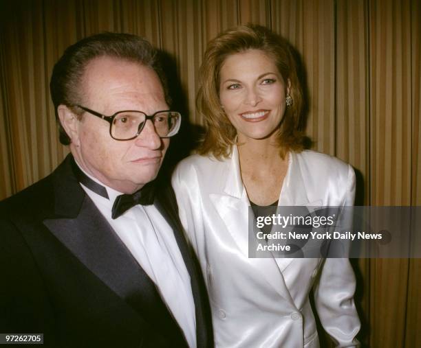 Larry King and fiance, singer Shawn Southwick, attend the Songwriters Hall of Fame dinner at the Sheraton Center.