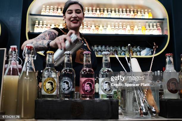 Chokie Tom, a brand ambassador for Thomas Henry, mixes a drink at Bar Convent Brooklyn, an international bar and beverage trade show at the Brooklyn...