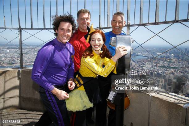 Anthony Field, Emma Watkins, Lechlan Gillespie and Simon Price of "The Wiggles" perform at The Empire State Building on June 12, 2018 in New York...
