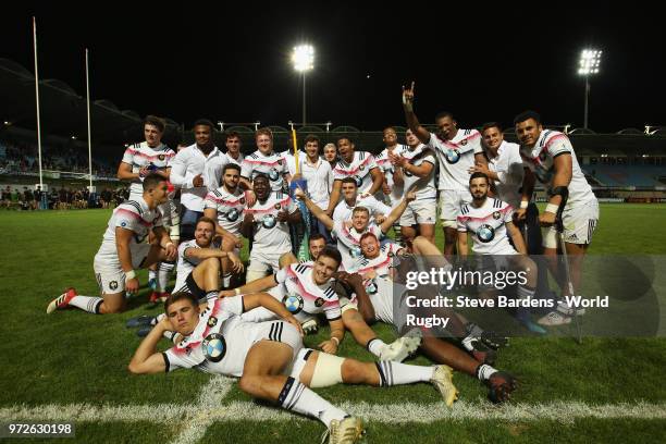 The France players celebrate their victory over New Zealand after the semi final match between New Zealand and France at Stade Aime-Giral on June 12,...