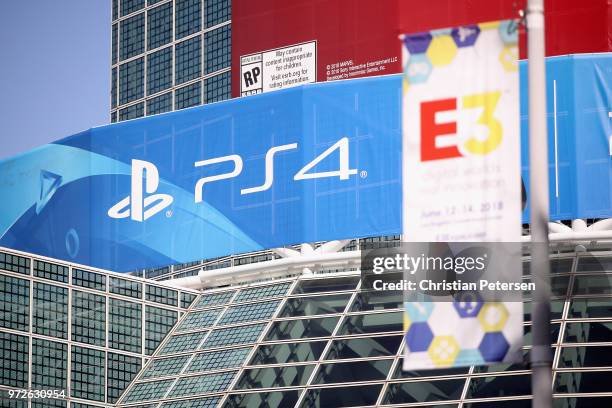 Sony PS4' logo is displayed outside of the Los Angeles Convention Center during the Electronic Entertainment Expo E3 on June 12, 2018 in Los Angeles,...