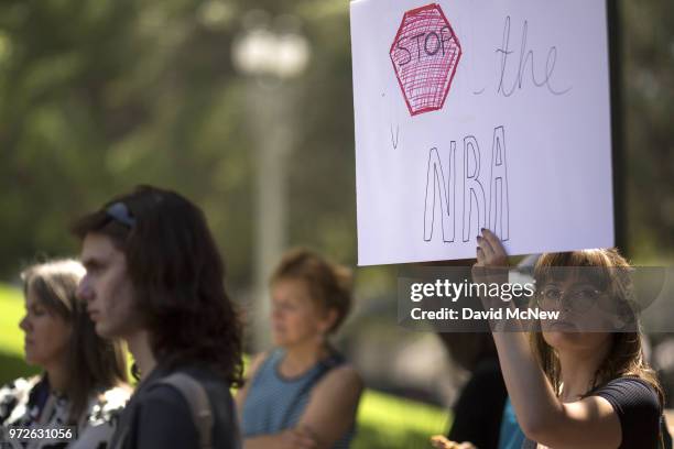 People gather on the two-year anniversary of the Pulse nightclub mass shooting to remember the victims and call for an end to gun violence on June...