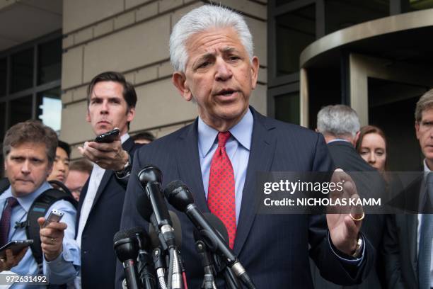 And Time Warner attorney Daniel Petrocelli speaks to the press after a court ruled that the 85 billion USD merger between AT&T and Time Warner could...