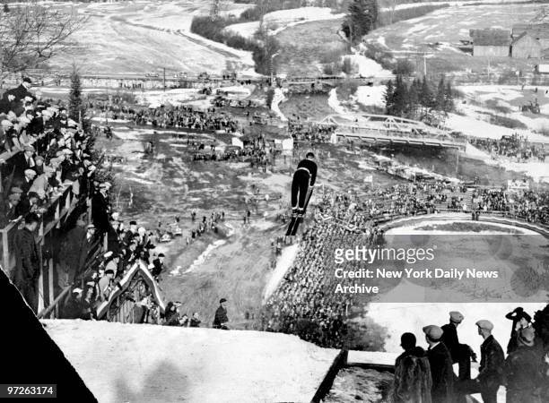 Birger Ruud, of Norway, in midair during his ski jump at the 1932 Winter Olympics.
