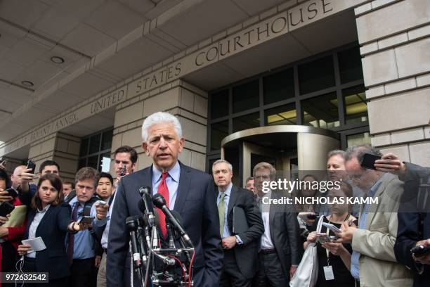 And Time Warner attorney Daniel Petrocelli speaks to the press after a court ruled that the 85 billion USD merger between AT&T and Time Warner could...