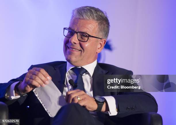 Jurgen Gerke, chief executive officer of Allianz Capital Partners, smiles during the International Economic Forum Of The Americas in Montreal,...