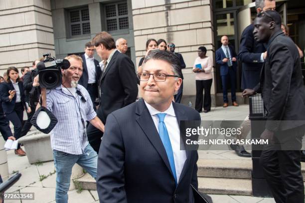 Assistant Attorney General Makan Delrahim walks to his car after a court ruled that the 85 billion USD merger between AT&T and Time Warner could go...