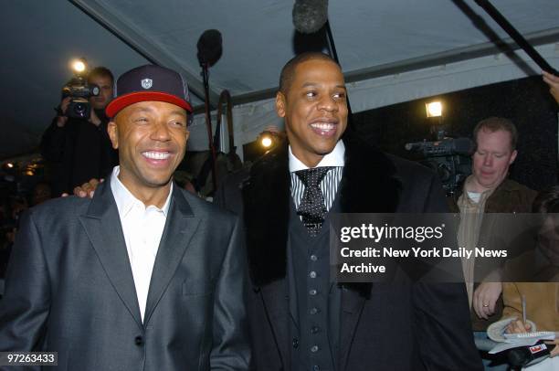 Russell Simmons and Jay-Z arrive at the Ziegfeld Theatre on W. 54th St. For the world premiere of the documentary film "Fade to Black." The movie...