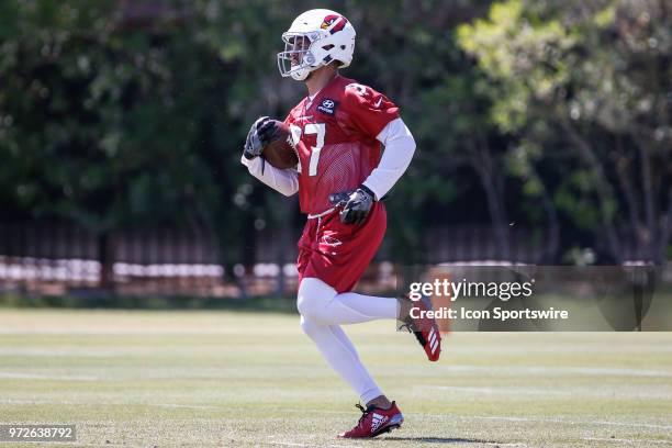 Arizona Cardinals running back D.J. Foster runs the ball during the Arizona Cardinals Miniicamp on Jun 12, 2018 at the Arizona Cardinals Training...