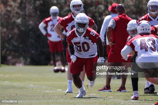 Arizona Cardinals linebacker Airius Moore runs a drill during the Arizona Cardinals Miniicamp on Jun 12, 2018 at the Arizona Cardinals Training...