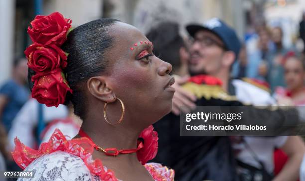 Dancer of Marcha de Bica is seen dressed in costume in the old quarter of Bica before leaving to parade in Avenida da Liberdade on June 12, 2018 in...