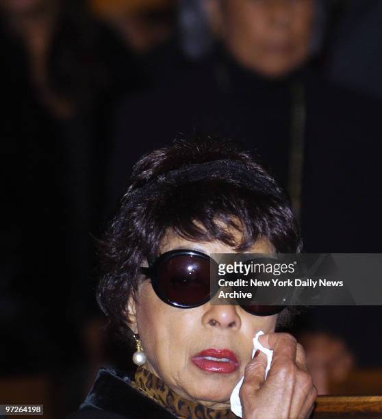 Ruby Dee, Ossie Davis' widow, wipes her eyes during funeral services for her husband at Riverside Church in Harlem. The 87-year-old actor died Feb. 4...